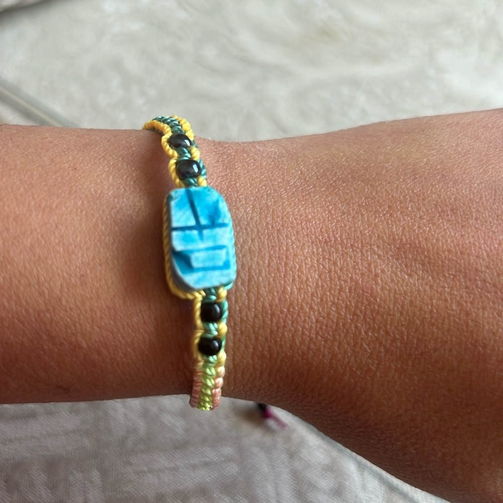 Egyptian scarab stone bracelet. Made with gorgeous yellow and green thread